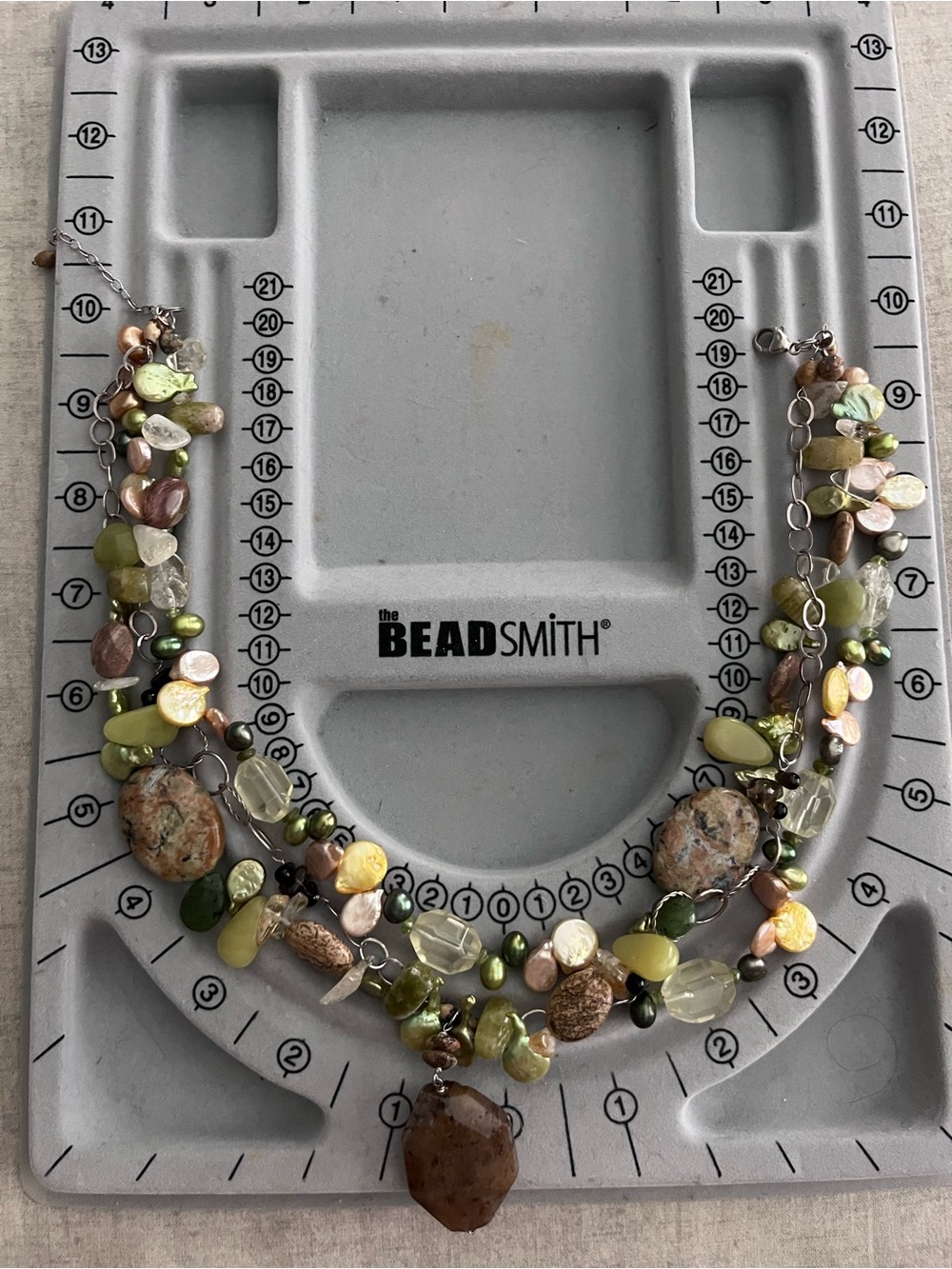 Multistrand Green and Earth-Tone Beaded Statement Necklace.